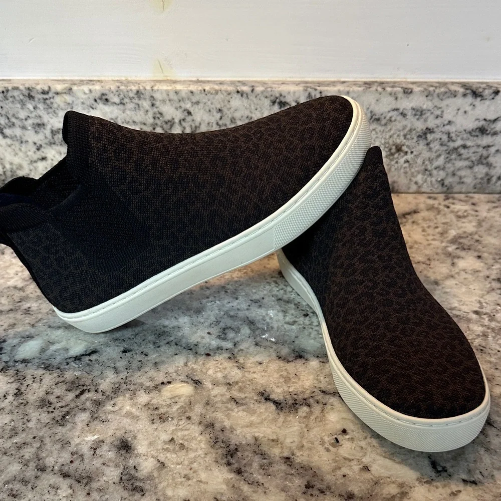 Rothy's Black and Brown leopard Knit Slip-Ons